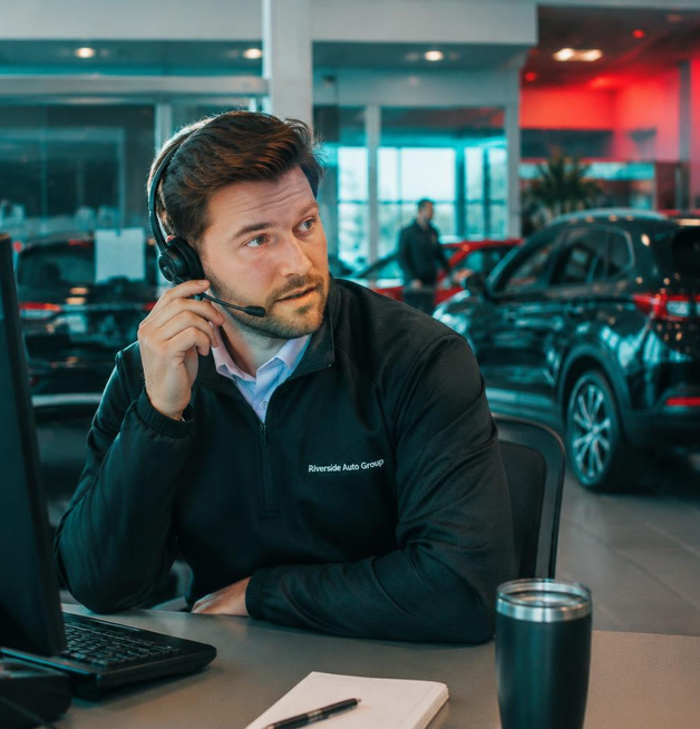 Live transfer of a verified customer to a dealership